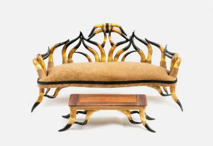 Miniature horn-framed settee and matching footstool